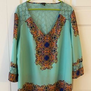 Teal blouse w/ bright paisley pattern, lace detail, & bell sleeves